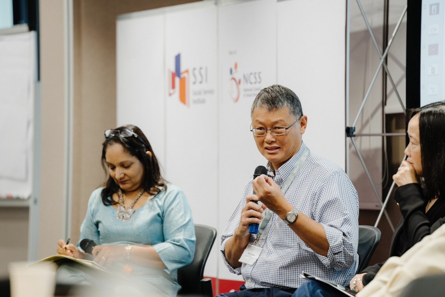 Dr Tan Chi Chiu is conducting a life coaching session in Singapore with other fellow life coaches